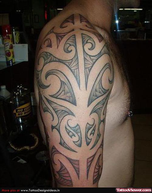 Man Right Half Sleeve Tribal Hawaiian Tattoo