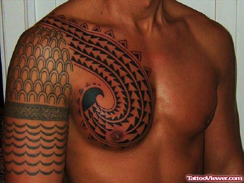 Beautiful Hawaiian Tattoo On Man Chest And Half Sleeve