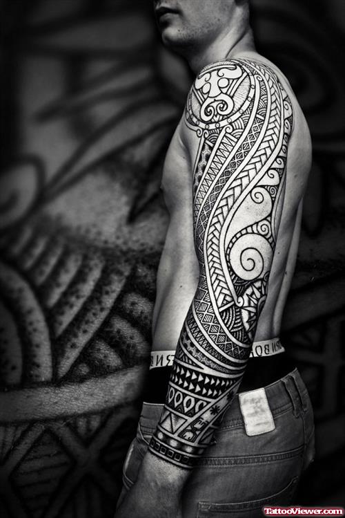 Tribal Hawaiian Tattoo On Man Left Sleeve