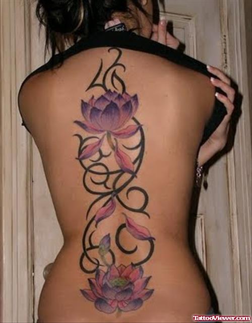 Tribal And Hawaiian Lotus Flower Tattoo On Back