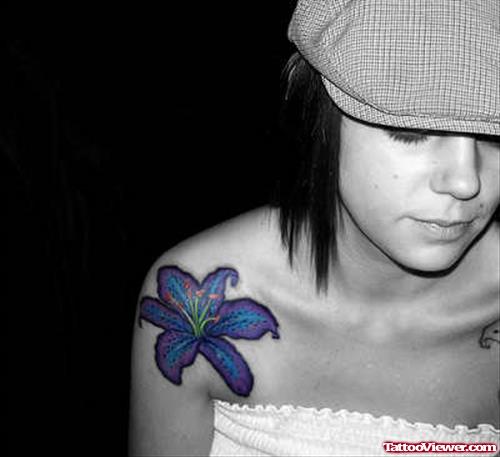 Blue Ink Flower Hawaiian Tattoo On Shoulder