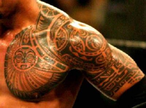 Amazing Hawaiian Chest And Half sleeve Tattoo