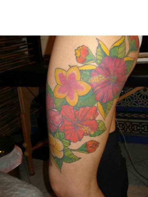 Amazing Colored Hawaiian Tattoo On Right Sleeve