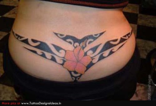 Lowerback Tribal And Flower Hawaiian Tattoo