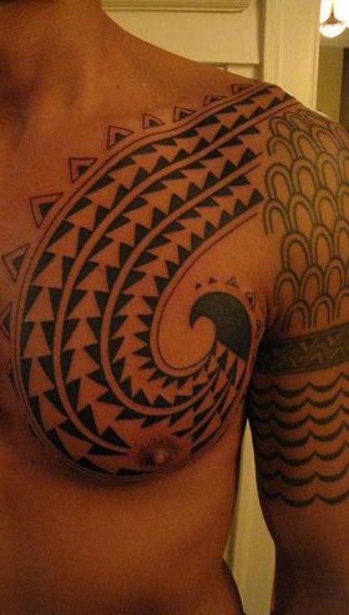 Awful Hawaiian Tattoo On Man Chest And Half Sleeve