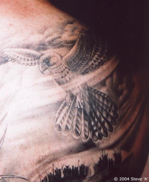 Grey Ink Flying Hawk Tattoo Picture