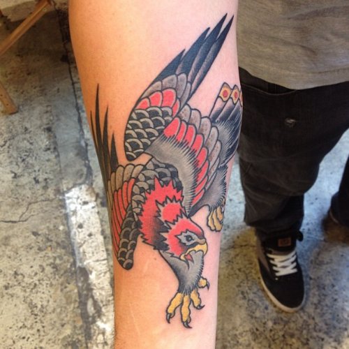 Colored Right Arm Flying Hawk Tattoo