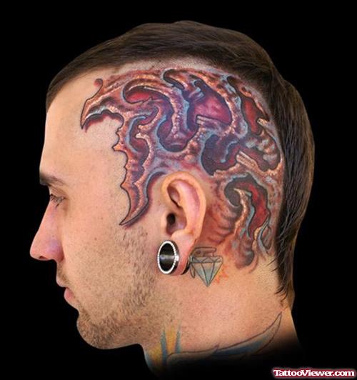 Attractive Color Ink Biomechanical Head Tattoo