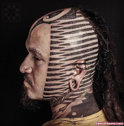 Awesome Black Ink Tribal Head Tattoo