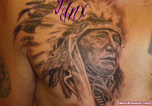 Grey Ink Native Head Tattoo On Man Chest