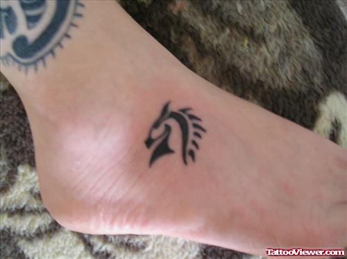 Black Tribal Horse Head Tattoo On Foot