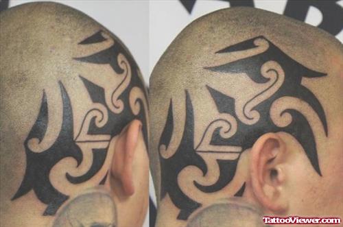 Awesome Black Tribal Head Tattoos