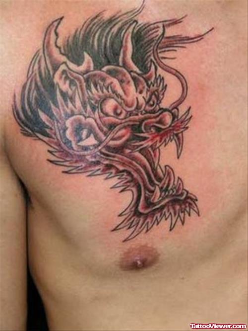 Grey Ink dragon Head Tattoo On Man Chest