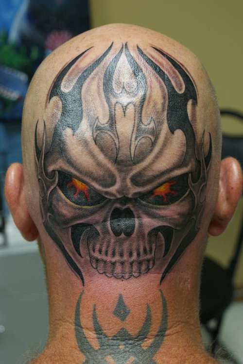 Red Eyes Tribal Skull Head Tattoo