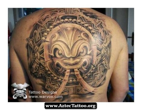 Amazing Grey Ink Aztec Head Tattoo On Back