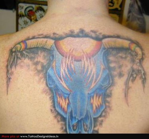 Blue Ink Bull Head Tattoo On Upperback