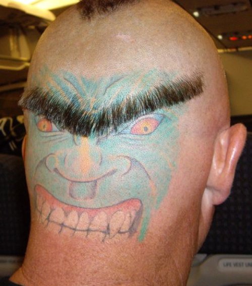 Demon Face Tattoo On Back Head