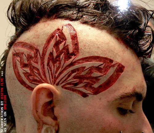 Red Ink Head Tattoo For Girls
