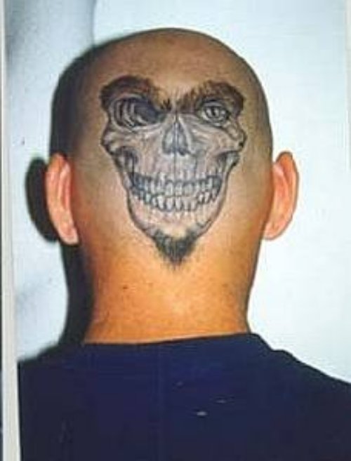 Grey Ink Skull Back Head Tattoo
