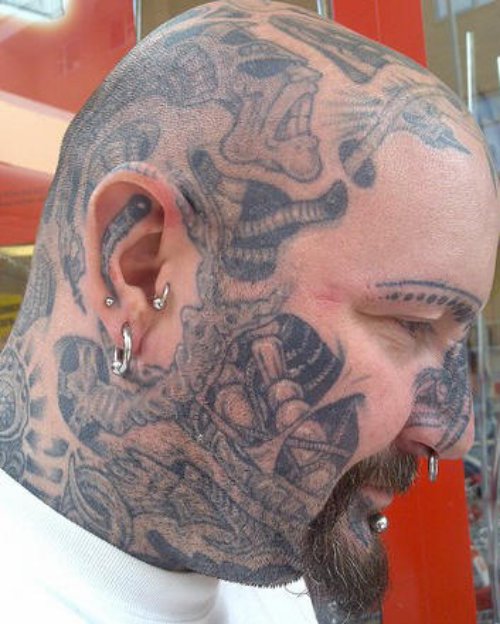Grey Ink Biomechanical Head Tattoo