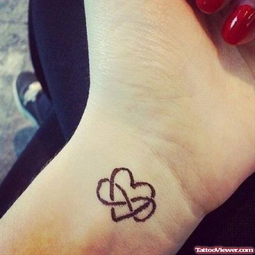 Infinity Symbols And Heart Tattoo on Left Wrist