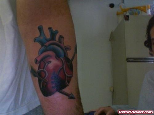 Colored Heart Tattoo On Left Arm