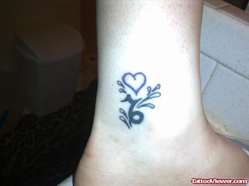 Capricorn Zodiac And Heart Tattoo On Ankle