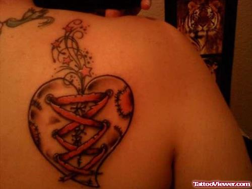 Broken Heart Tattoo On Back SHoulder