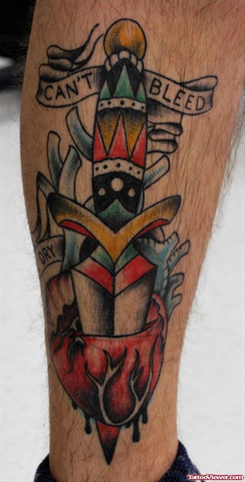 Colored Dagger and Heart Tattoo On Leg