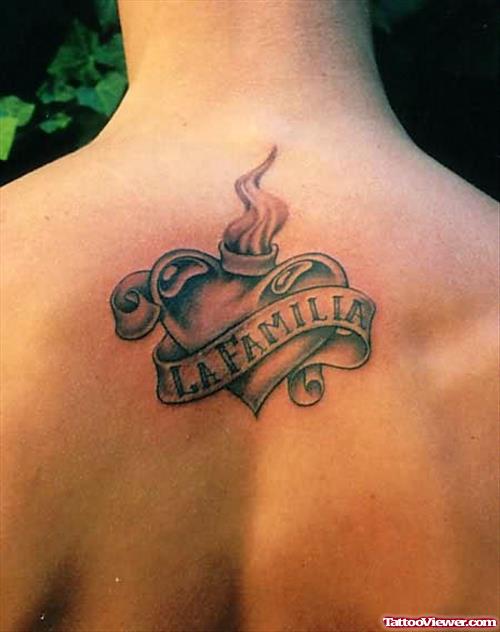 Burning Heart Tattoo On Upperback