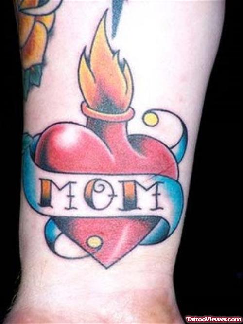 Mom Banner And Burning Heart Tattoo On Arm