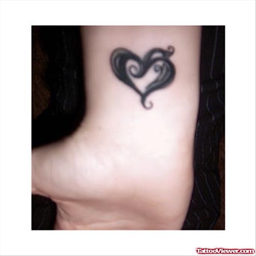 Black Heart Tattoo On Wrist