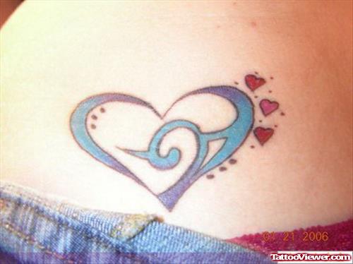 Blue Tribal Heart Tattoo On Lowerback