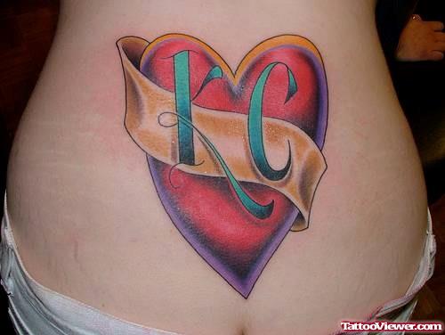 Kc Banner and Heart Tattoo On Lowerback