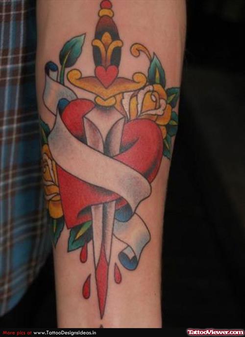 Banner And Dagger Heart Tattoo On Left Arm