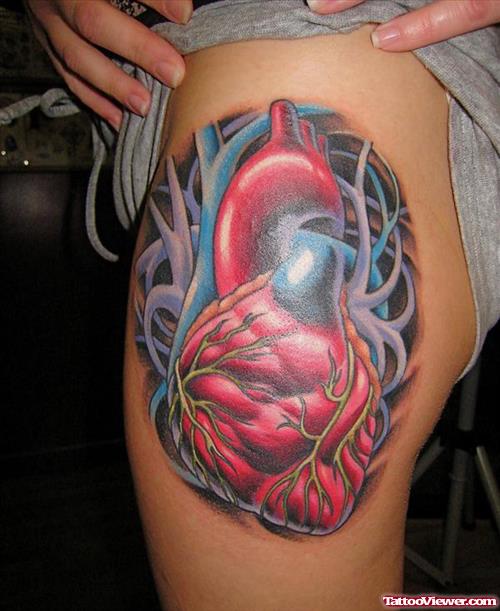 Real Heart Tattoo On Side