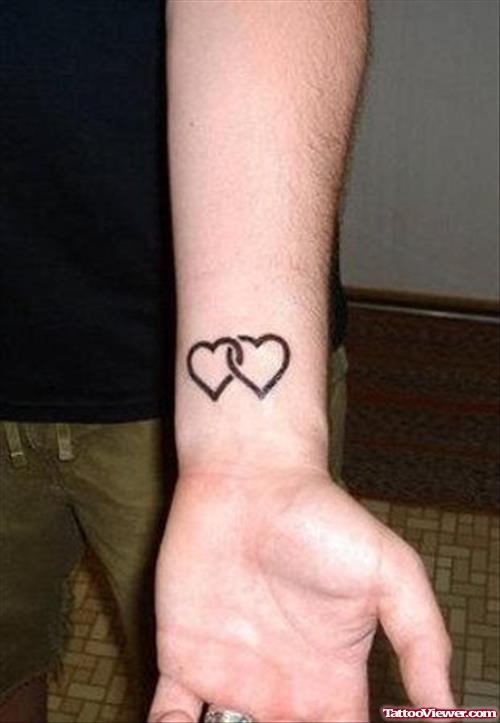 Tiny Heart Tattoos On Left Wrist