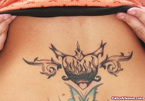 Awesome Grey Ink Heart Tattoo On Lowerback