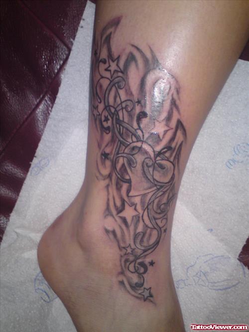 Grey Ink Stars and Heart Tattoo On Ankle