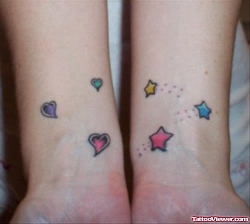 Small Stars and Heart Tattoos On Wrists
