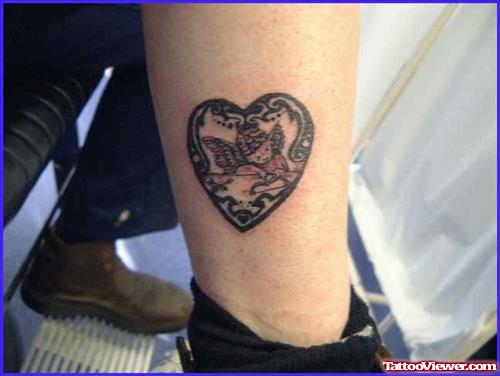 Cute Angel In Heart Tattoo