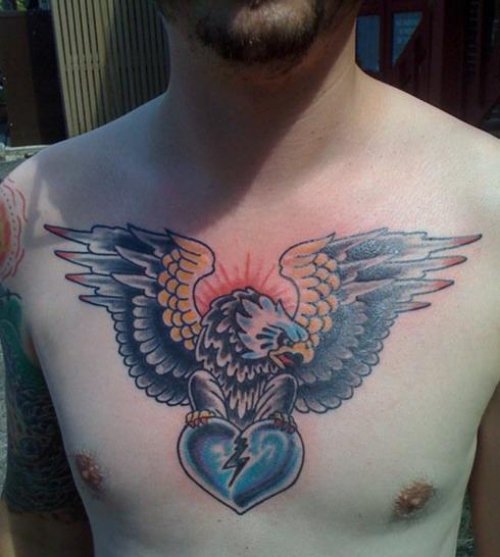 Blue Heart And Eagle Tattoo On Man Chest