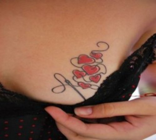 Needle And Thread With Hearts Tattoos On Chest
