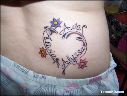 Flowers And Heart Tattoo On Lowerback