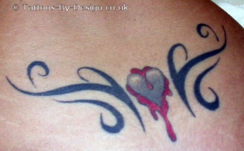 Awesome Black Ink Tribal And Heart Tattoo