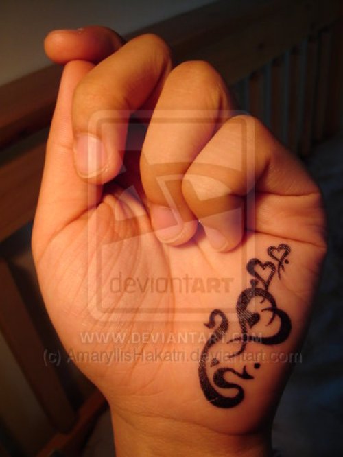 Black Tribal Heart Tattoo On Left Hand