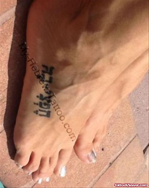 Attractive Hebrew Tattoo On Right Foot