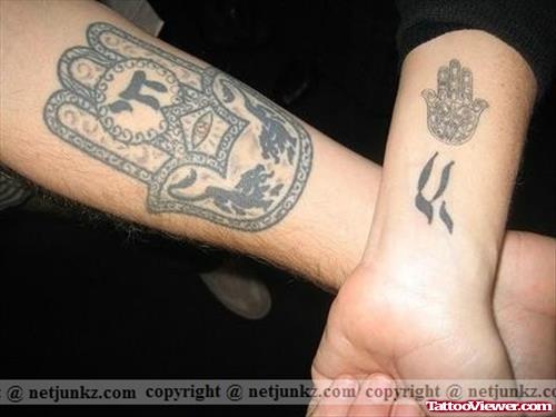 Grey Ink Hebrew Tattoos On Forearm