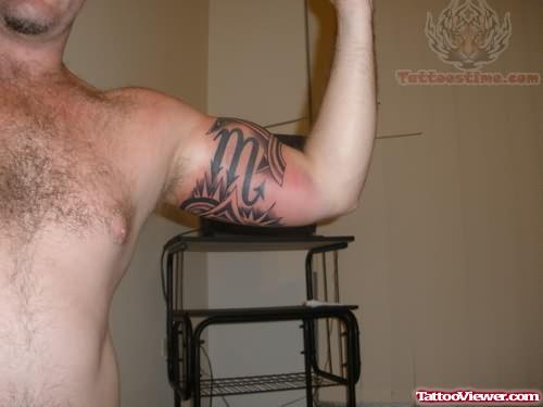 Large Hebrew Tattoo On Muscles