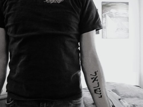 Beautiful Hebrew Tattoo On Left Forearm